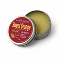 Maison Tisane Sweet Orange lip balm in a metal tin on a white background